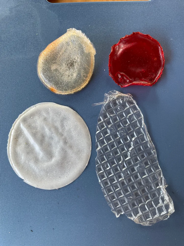 Round material samples and a translucent textured swatch