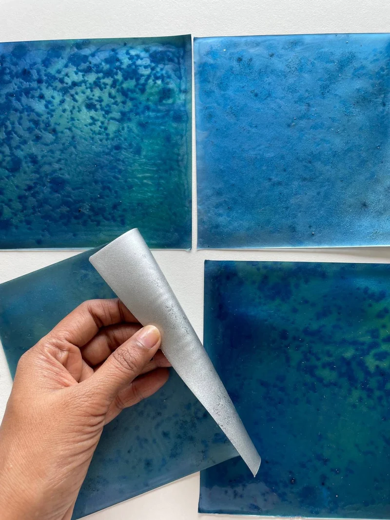 Fabulose® cellulose film sheets with a sheet lifted by hand